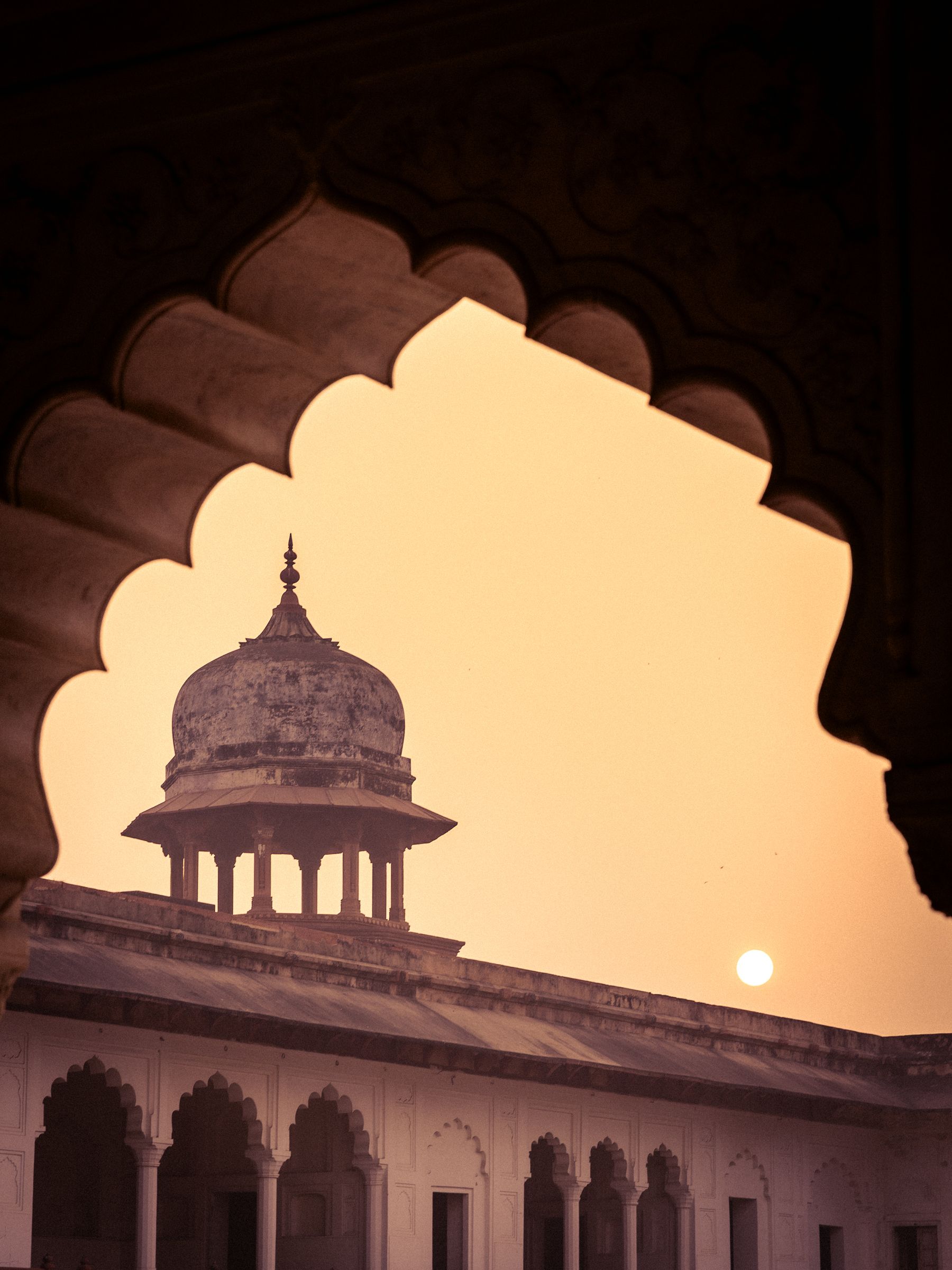 Chhatri Framed By Arch At Sunset